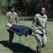 23rd Force Support Squadron Airmen carry a simulated casualty during Exercise Ready Tiger 22-01