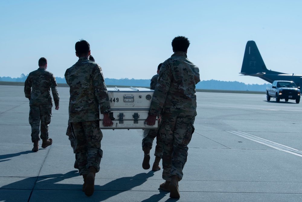 23rd Force Support Squadron Airmen transport a simulated casualty for transfer during Exercise Ready Tiger