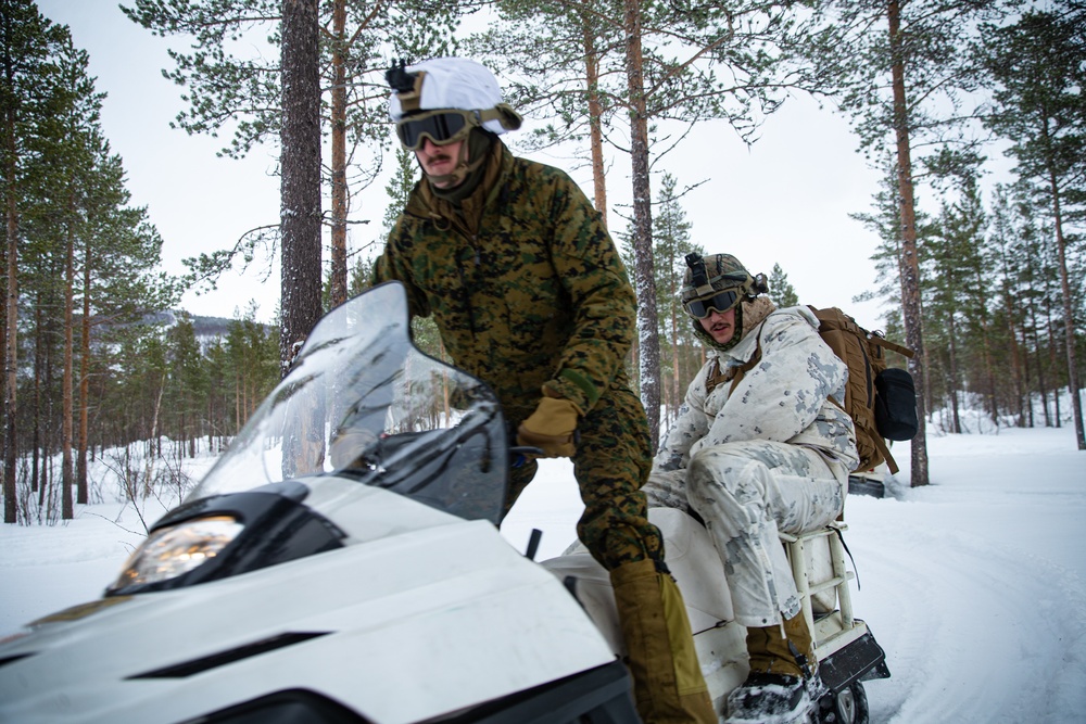 U.S. Marines Learn how to ride snowmobiles