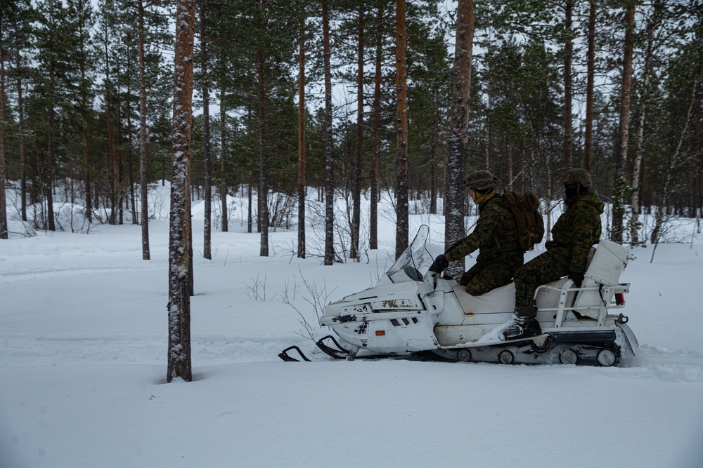 U.S. Marines Learn how to ride snowmobiles