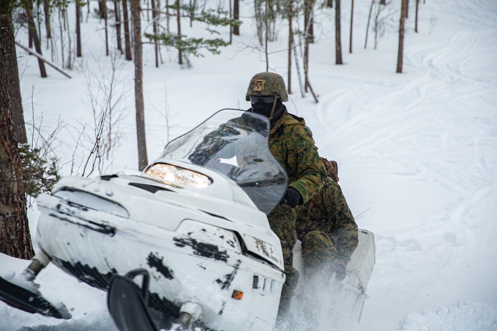 U.S. Marines learn how to ride snowmobiles