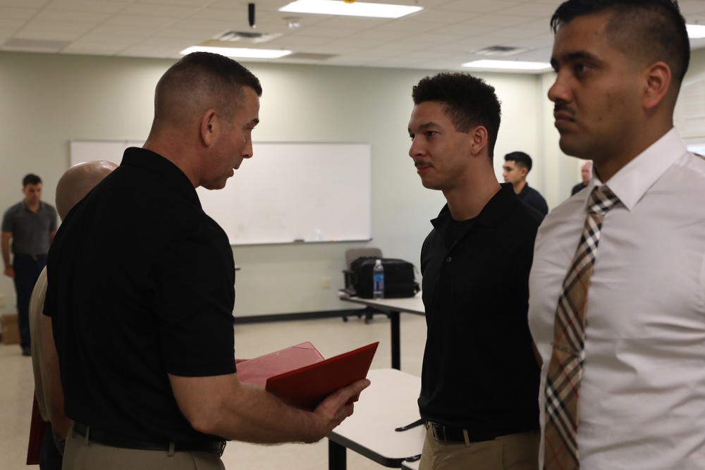 U.S. Marine Recruiters with Recruiting Station Baton Rouge are awarded by 6th Marine Corps District Commanding Officer