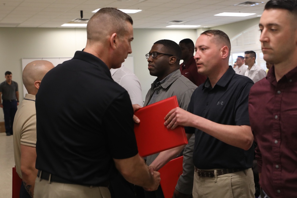 U.S. Marine Recruiters with Recruiting Station Baton Rouge are awarded by 6th Marine Corps District Commanding Officer