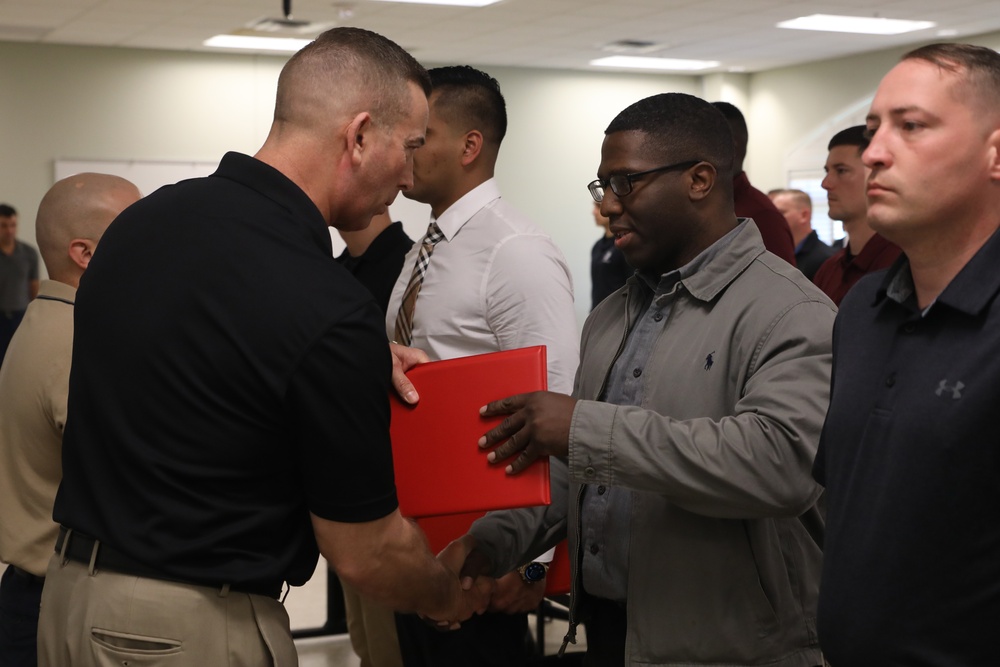 U.S. Marine Recruiters with Recruiting Station Baton Rouge are awarded by 6th Marine Corps District Commanding Officer