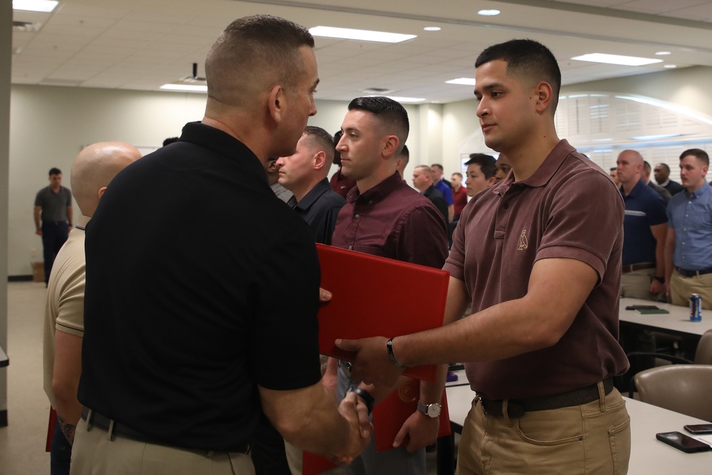 U.S. Marine Recruiters with Recruiting Station Baton Rouge are awarded by 6th Marine Corps District Commanding Officer