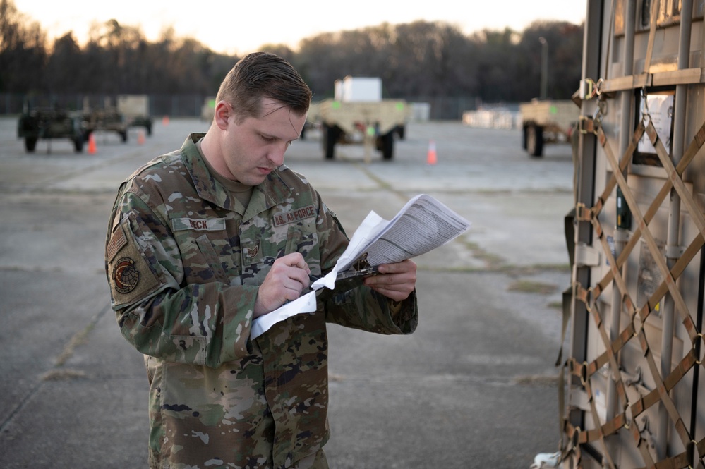 CRW Airmen build load plans, prep and load cargo for transport