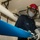 Sailors Aboard USS Ralph Johnson (DDG 114) Conduct a Damage Control Drill