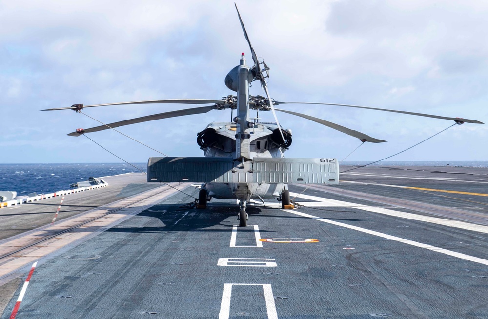 An MH-60S Sea Hawk Helicopter Rests On The Flight Deck