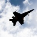 F/A-18E Super Hornet Flies Over Flight Deck