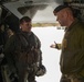 Norwegian Army Lt. Gen. Yngve Odlo speaks with CH-53 Super Stallion Crew Chief