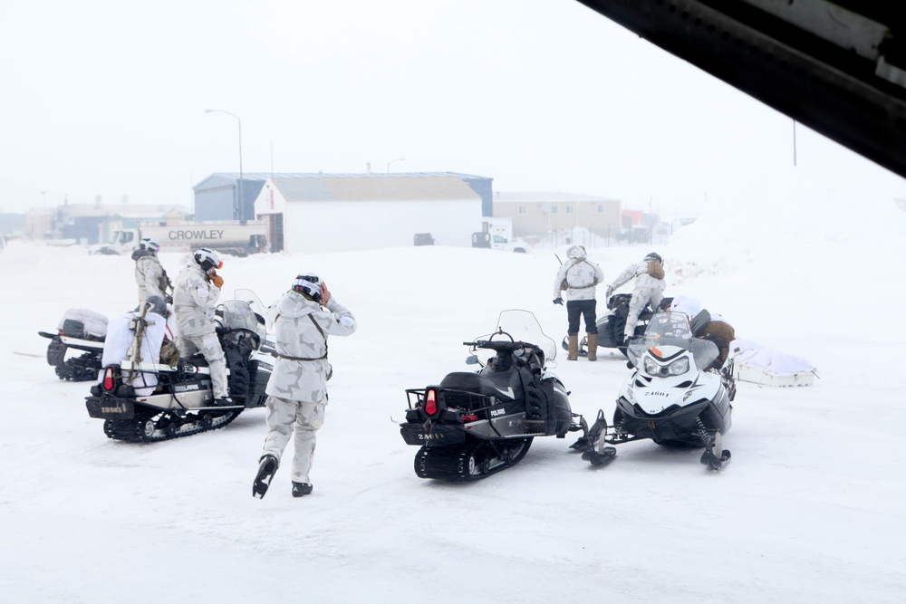 U.S. Army Special Forces assigned to 10th Special Forces Group (Airborne) prepare their equipment for exercise Arctic Edge