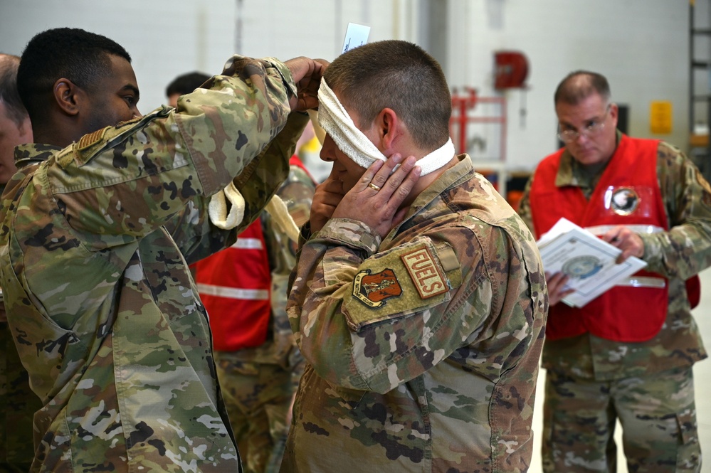 Photo of 116th Maintenance Group practicing Wartime Survival Skills