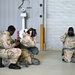 Photo of 116th Maintenance Group practice Wartime Survival Skills