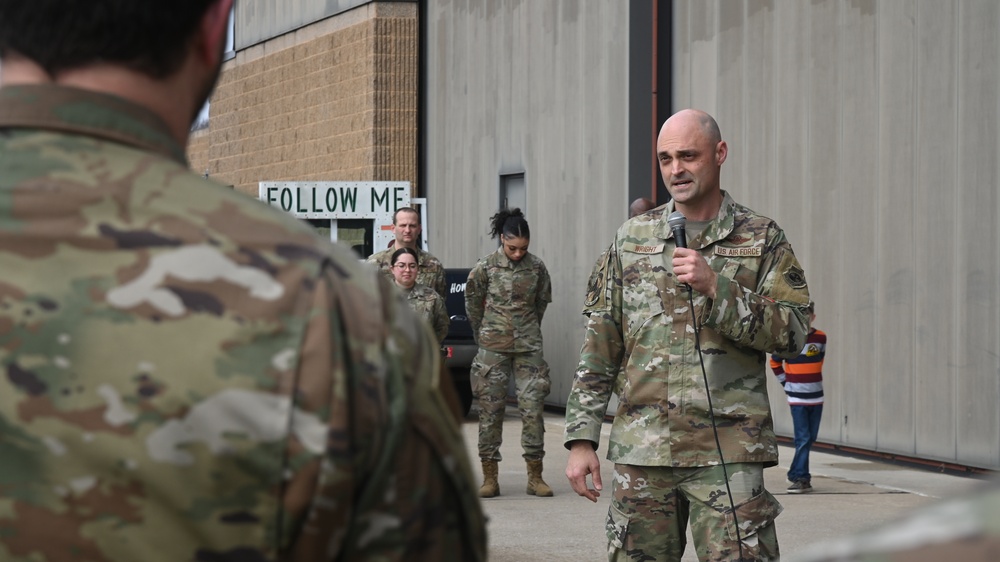 U.S. Air Force Col. David R. Wright delivers a commander's call