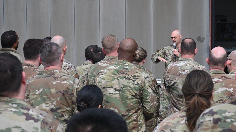 U.S. Air Force Col. David R. Wright delivers a commander's call