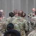 U.S. Air Force Col. David R. Wright delivers a commander's call