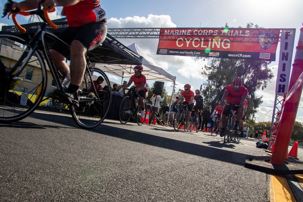 U.S. Marines with Wounded Warrior Regiment compete in the Marine Corps Trails cycling competition