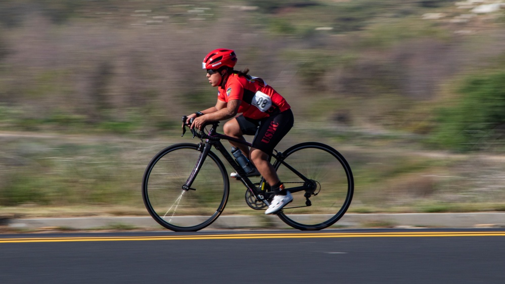 U.S. Marines with Wounded Warrior Regiment compete in the Marine Corps Trails cycling competition