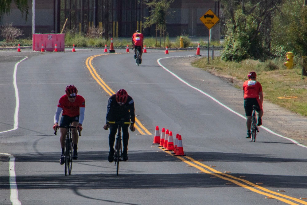 U.S. Marines with Wounded Warrior Regiment compete in the Marine Corps Trails cycling competition