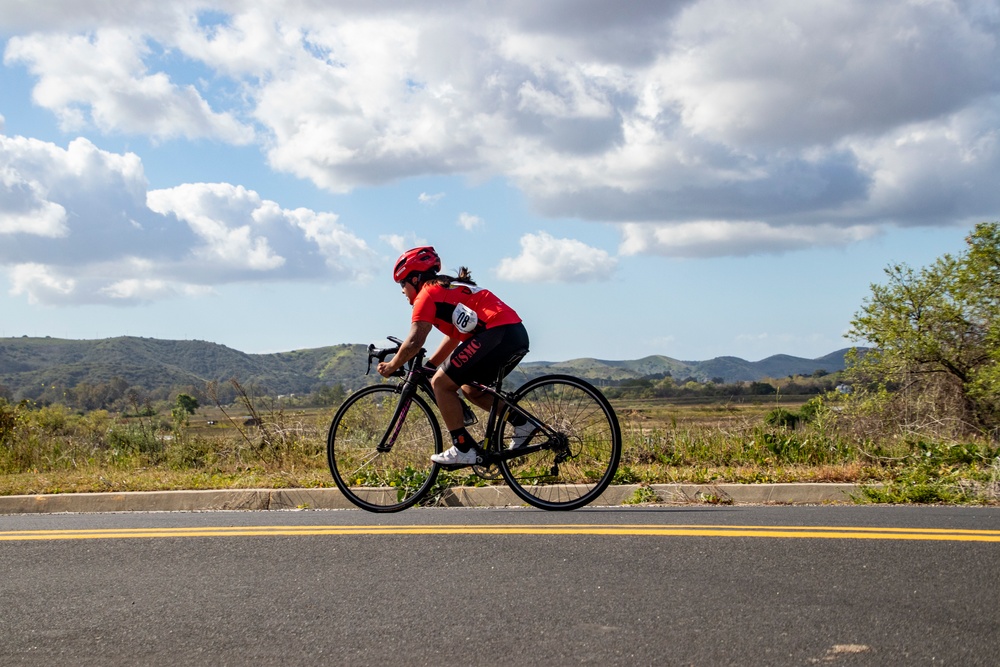 U.S. Marines with Wounded Warrior Regiment compete in the Marine Corps Trails cycling competition