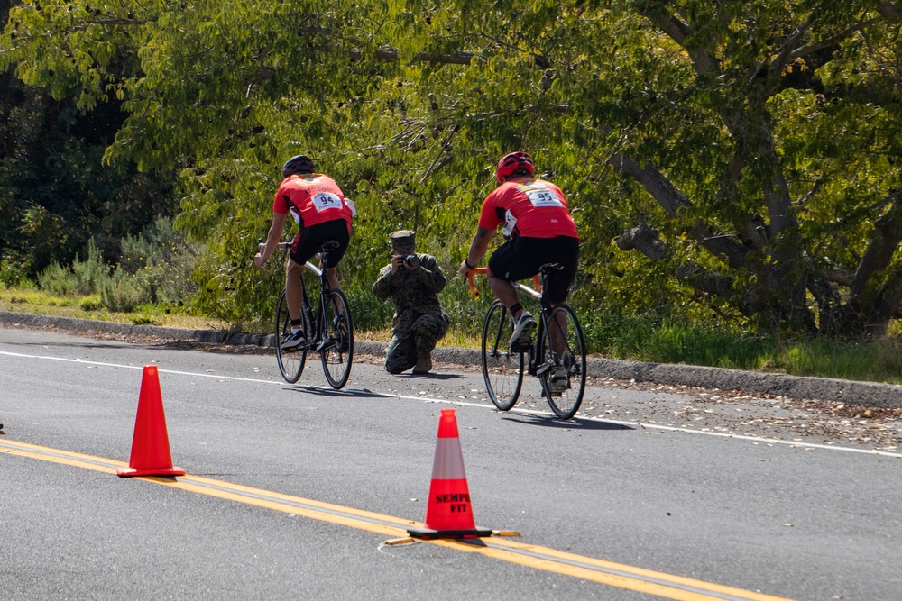 U.S. Marines with Wounded Warrior Regiment compete in the Marine Corps Trails cycling competition