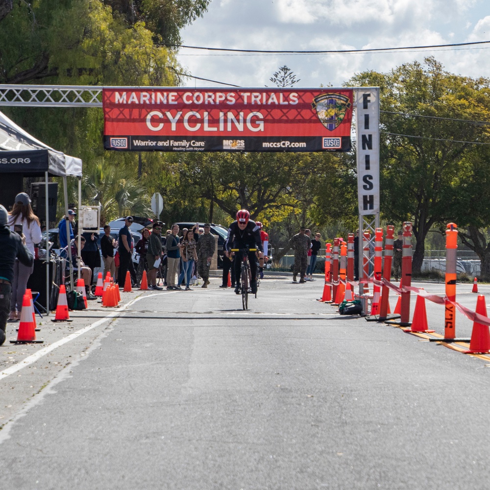 U.S. Marines with Wounded Warrior Regiment compete in the Marine Corps Trails cycling competition