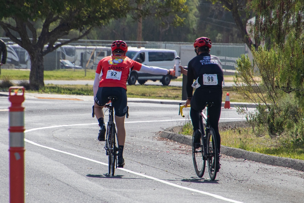 U.S. Marines with Wounded Warrior Regiment compete in the Marine Corps Trails cycling competition