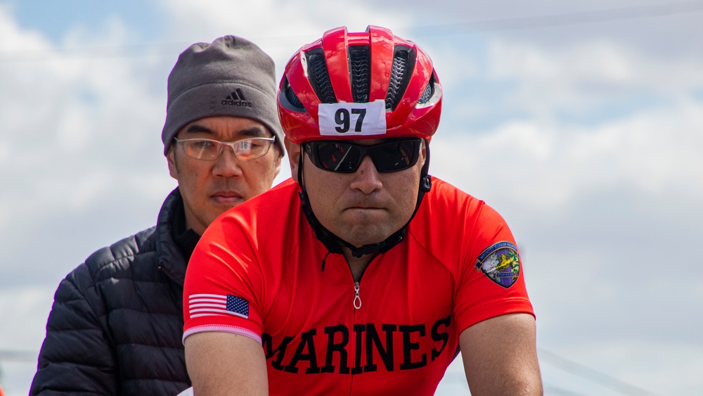 U.S. Marines with Wounded Warrior Regiment compete in the Marine Corps Trails cycling competition