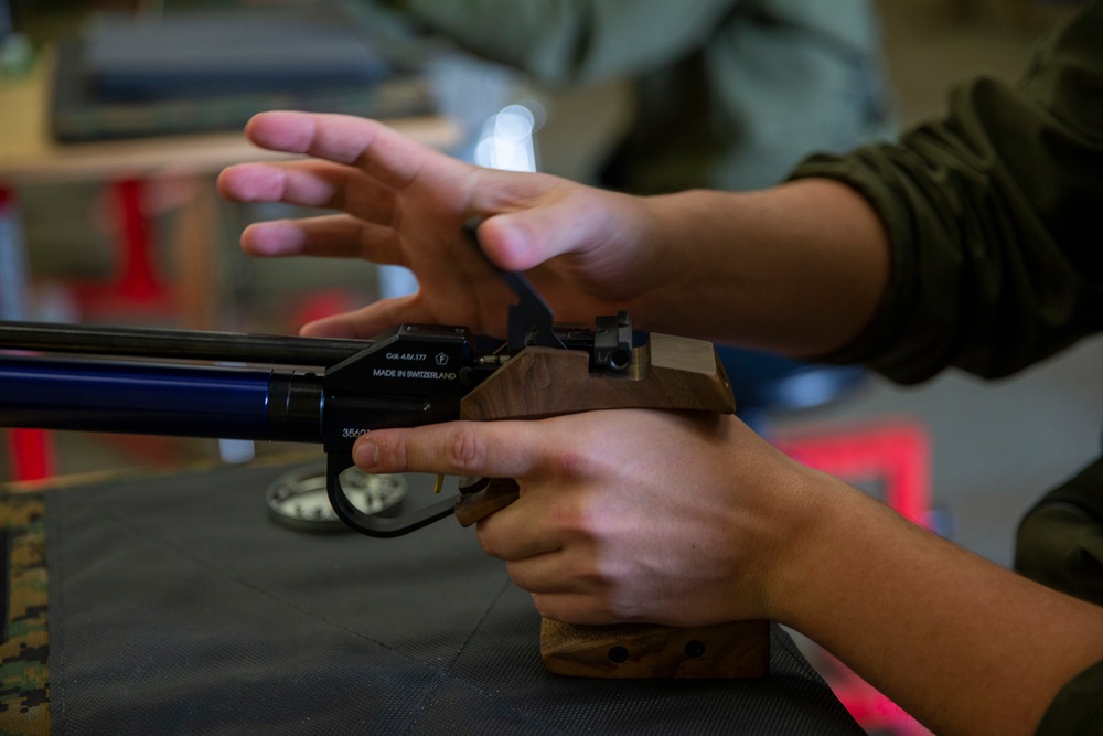 : U.S. Marines with Wounded Warrior Regiment compete in the Marine Corps Trails shooting competition