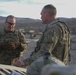 Lt. Gen. Robert &quot;Pat&quot; White, commanding general of III Corps, discusses unit readiness and mission capabilities with Col. Thomas Smith during National Training Center Rotation (22-04)