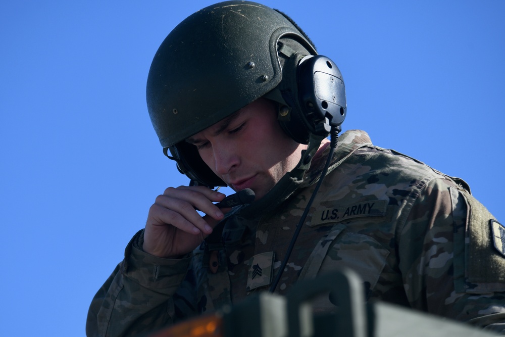 182nd Field Artillery loads HIMARs on C-17 at Selfridge