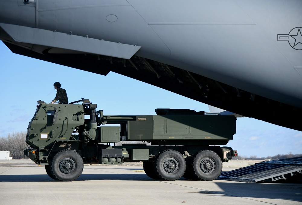 182nd Field Artillery loads HIMARs on C-17 at Selfridge