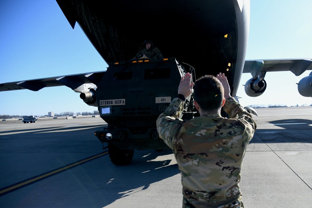 182nd Field Artillery loads HIMARs on C-17 at Selfridge