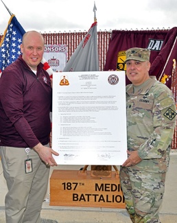 187th Medical Battalion signs Adopt-A-School charter with Davenport High School