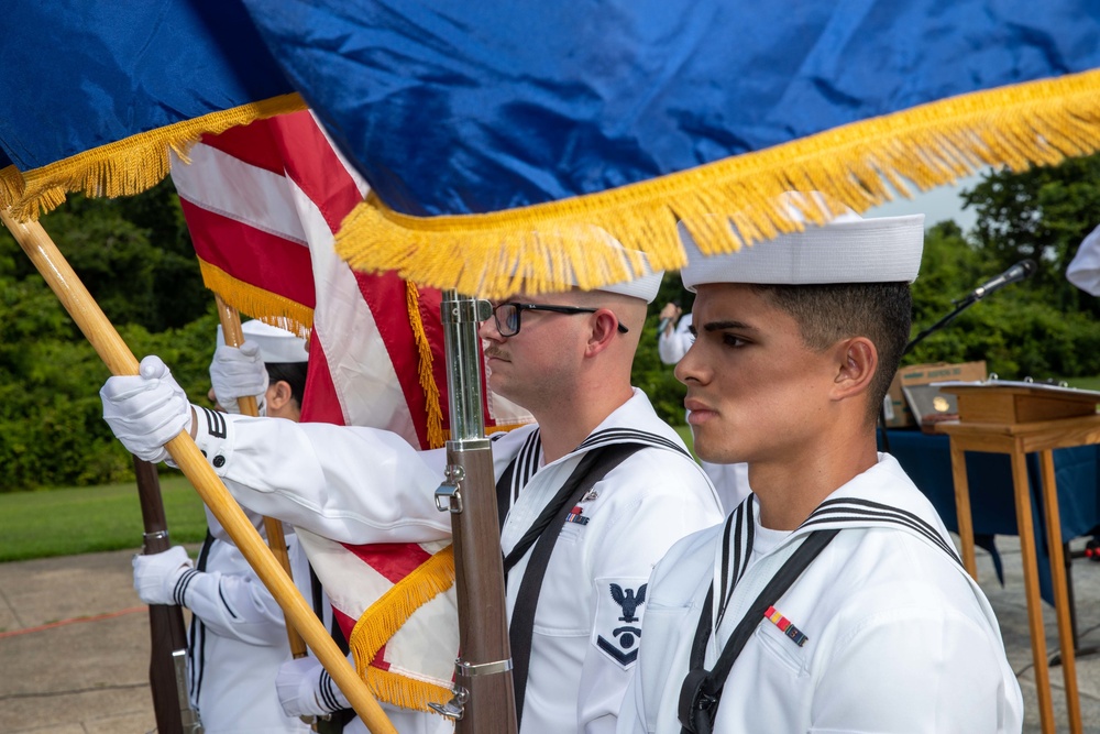 Sailors aboard the Nimitz-class aircraft carrier USS George Washington (CVN 73), Participate in a retirement ceremony for Mater Chief Harness.
