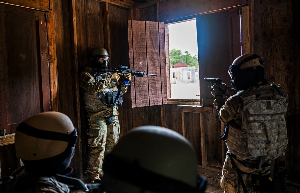 Field Craft Hostile students conduct urban environment training
