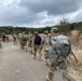 Soldiers Participate in a Ruck March