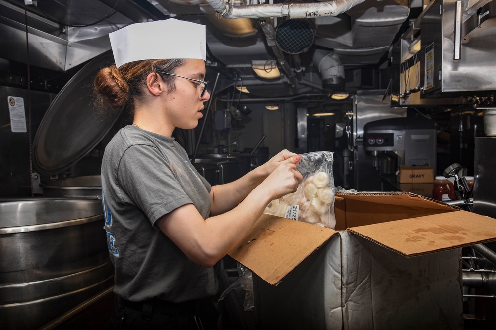 Abraham Lincoln Sailors prepare food
