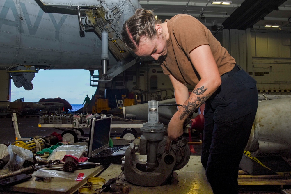 Abraham Lincoln Sailors conduct aircraft maintenance