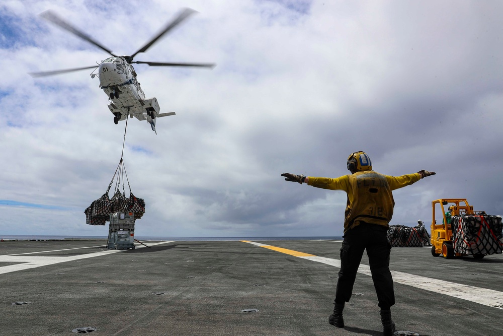Abraham Lincoln conducts a RAS with Alan Shepard