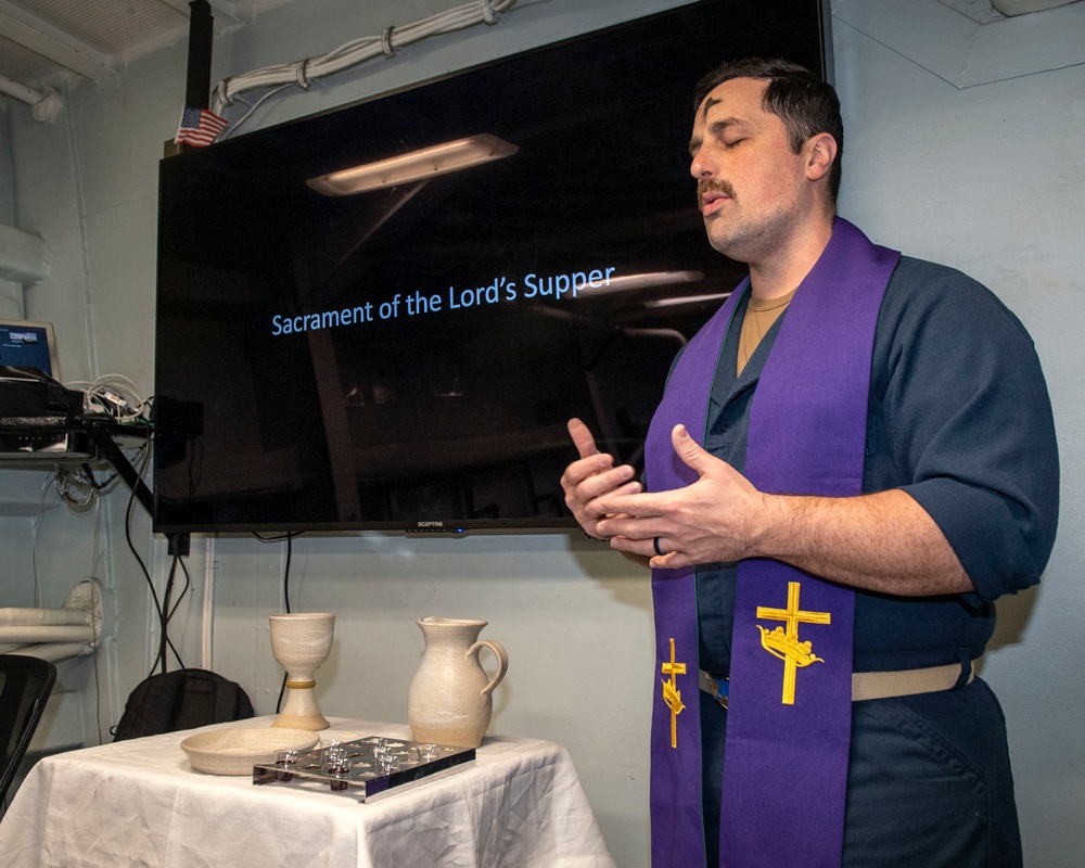 Chaplain Lt. Jim Pulizzi, from Chesapeake, Va., hosts an Ash Wednesday service