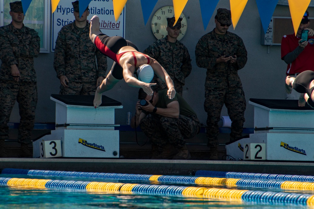 U.S. Marines with Wounded Warrior Regiment compete in the Marine Corps Trials swimming competition