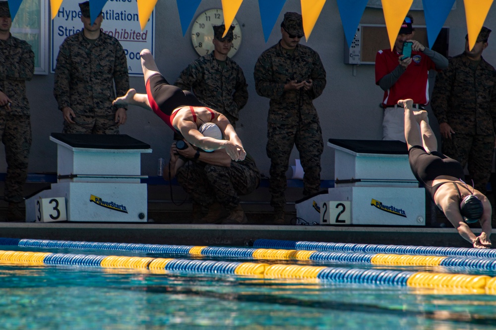 U.S. Marines with Wounded Warrior Regiment compete in the Marine Corps Trials swimming competition