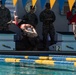 U.S. Marines with Wounded Warrior Regiment compete in the Marine Corps Trials swimming competition