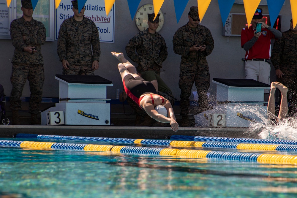 U.S. Marines with Wounded Warrior Regiment compete in the Marine Corps Trials swimming competition