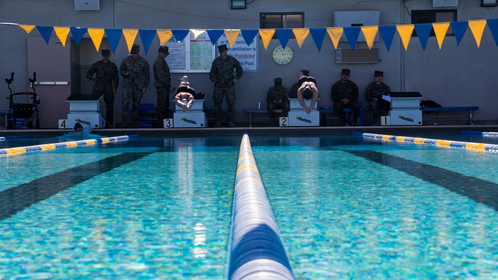 U.S. Marines with Wounded Warrior Regiment compete in the Marine Corps Trials swimming competition