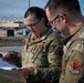 4th OSS Airmen predict weather forecasts.