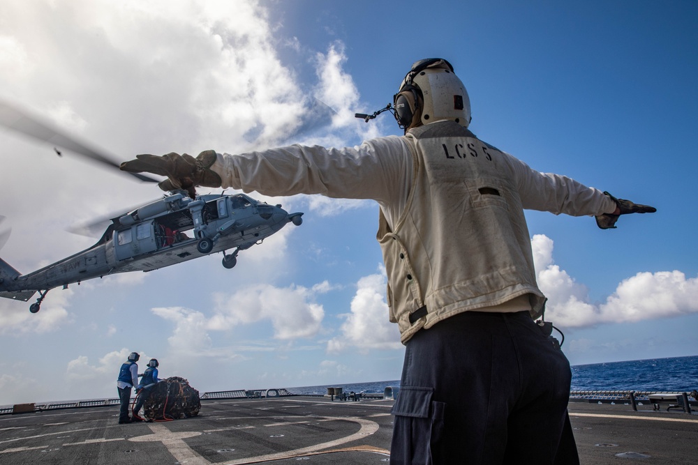USS Milwaukee Conducts A Vertical Replenishment