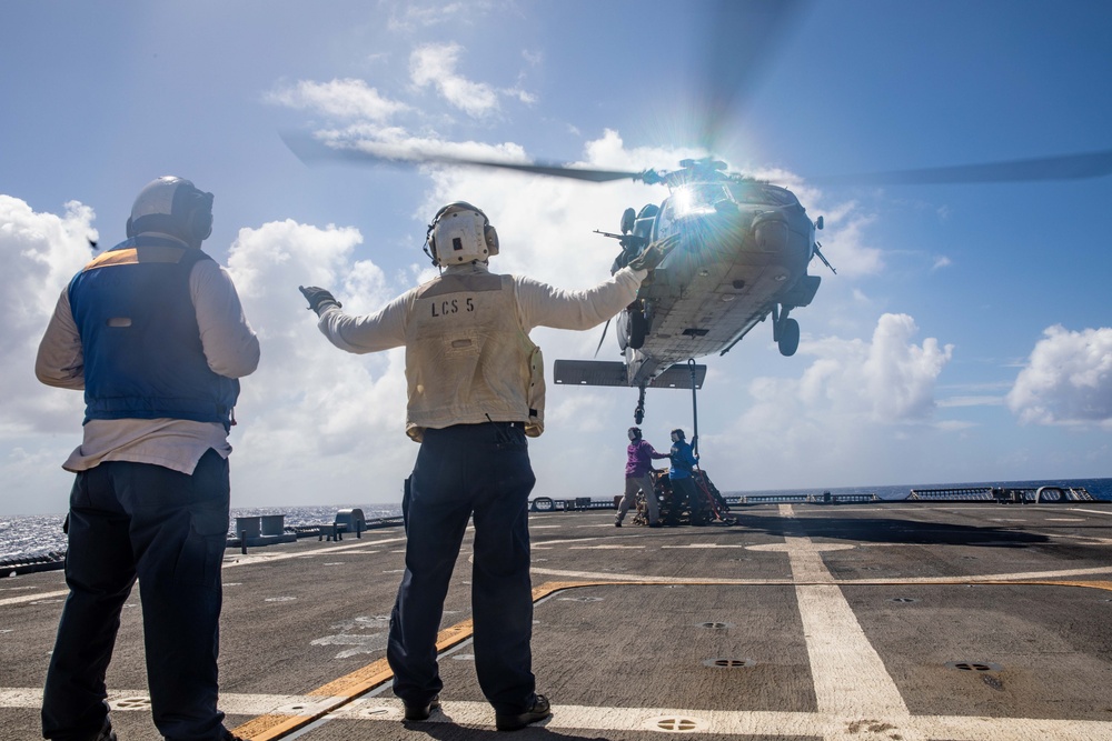 USS Milwaukee Conducts A Vertical Replenishment