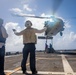 USS Milwaukee Conducts A Vertical Replenishment